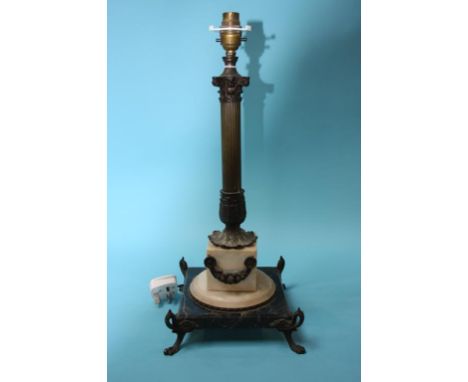 An ornate Corinthian column table lamp