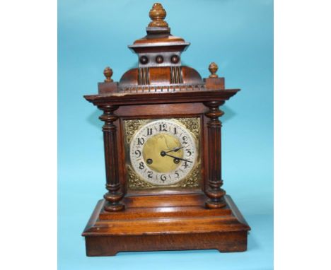 A walnut cased 8 day mantel clock