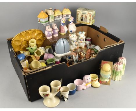 A Large Collection of Various Novelty Ceramic Egg Cups and Salt and Pepper Shakers