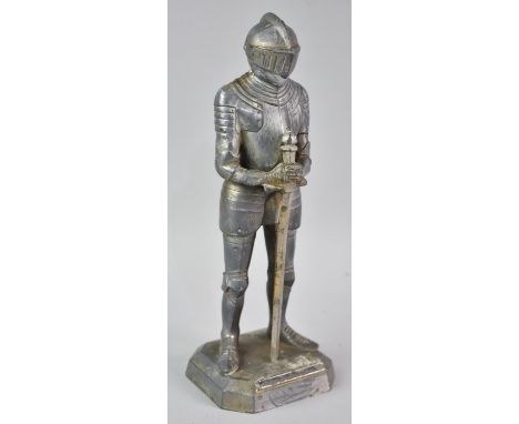 A Novelty Table Lighter in the Form of a Standing Medieval Knight with Hinged Helmet, Stamped 9142/7, Missing Wand, Made in W
