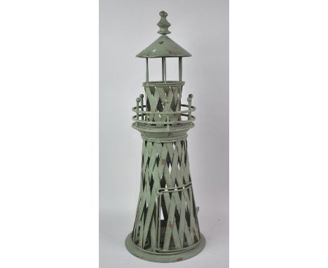 A Modern Metal Novelty Tealight Stand or Lantern in the Form of a Lighthouse, 42.5cms High