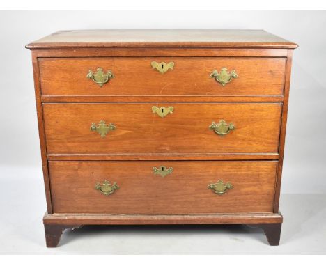 An Edwardian Mahogany Chest of Three Long Drawers on Bracket Feet, Top Drawer Fitted, 103cms Wide