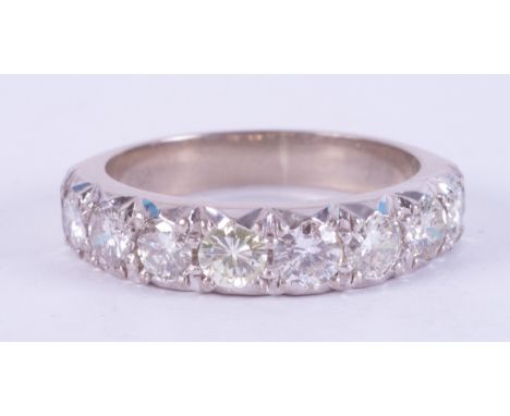 An 18ct white gold half eternity style ring set with eight round brilliant cut diamonds, approx. total diamond weight 0.80 ca