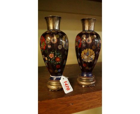 A pair of Japanese cloisonne enamel and silver mounted vases, 18cm high. Condition Report: Whilst both vases are in good orde