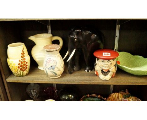 A mixed lot, to include: an ebony elephant; a Carltonware leaf dish; and a Clarice Cliff jug. 