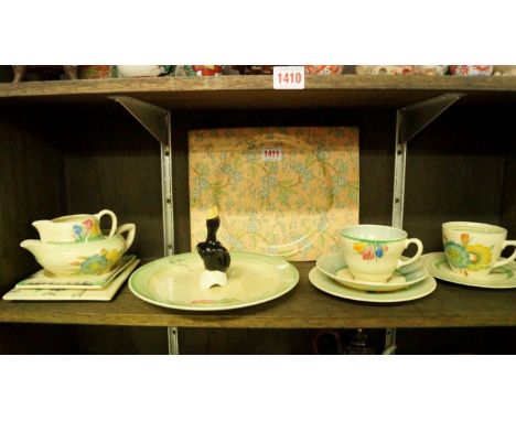 A small collection of Clarice Cliff; and similar pottery, to include 'Spring Crocus' items. 