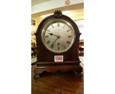 A 1920s mahogany mantel timepiece, the silvered circular dial inscribed 'F K Perkin & Sons, Wakefield', 23cm high. 