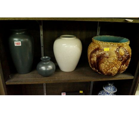 Two Poole pottery iridescent vases; together with another T G Green example; and a continental majolica jardiniere. 