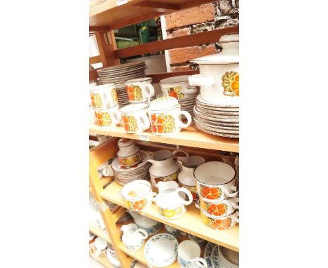 A Midwinter 'Nasturtium' part tea and dinner service, (two shelves). 