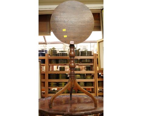 An 18th century mahogany tilt top tripod table, with piecrust top on cabriole legs, 76cm diameter; together with a 19th centu
