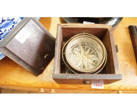 A 19th century gimble mounted compass, in mahogany case.