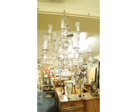 A grey painted and silvered two tier ceiling light, in the Dutch style.