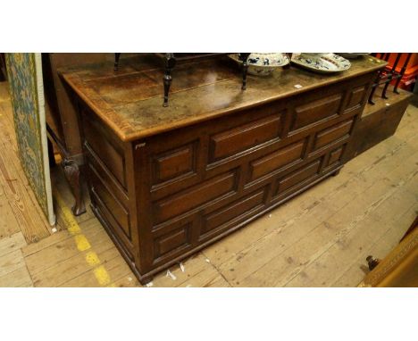 An early 18th century oak panelled coffer, with multiple fielded panel front, 155.5cm wide. 