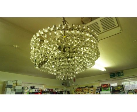 A chrome and faceted bead four tier ceiling light. 