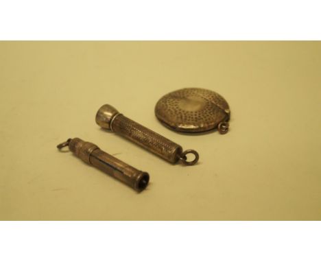 A silver engine turned cigar piercer, by S Mordan & Co, London 1934; together with a silver engine turned pencil cover by the