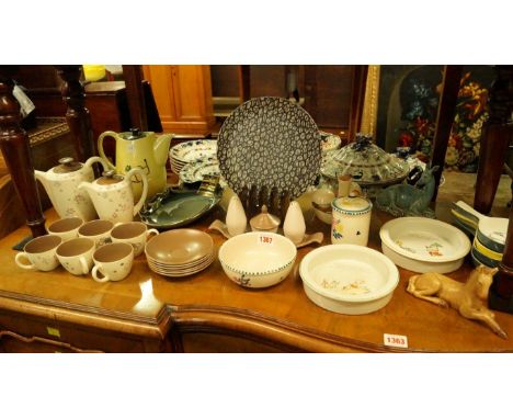 A collection of Poole pottery; together with two Shelley baby bowls; a Beswick deer; and similar. 