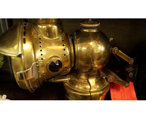 A World War I period Lucas Model 317 'Acetyphote' brass cycle lamp.