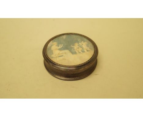 A continental silver engine turned circular box, import mark London 1919, J J H, the lid inset panel of lady playing pipe wit