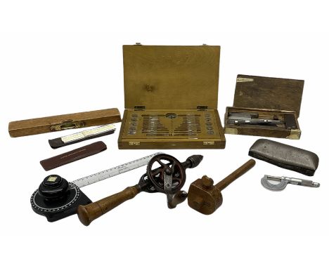 Various tools including boxed set of taps and dies, hand drill, set square, feeler gauges, micrometer screw gauge, steel rule