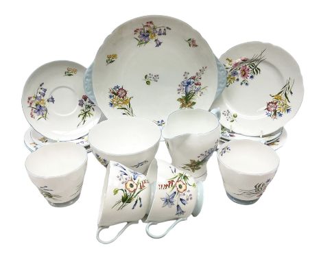 Shelley Wild Flowers pattern part tea service, comprising four cups and saucers, four dessert plates, cake plate, milk jug an