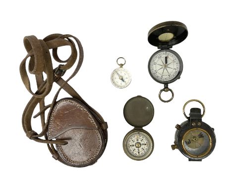 Early 20th century Verner's Service pattern type brass military compass, together with three further brass cased compasses an