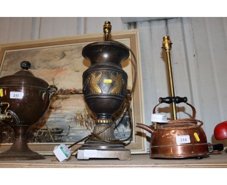A table lamp in the manner of a vintage Romanesque bronzed urn