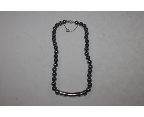 A titanium bead necklace 