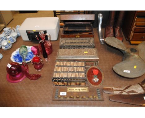 A carved trinket box; two porcupine quill boxes; a writing slope; a pipe rack; and a Legion Honour 1870-1951 medal (condition