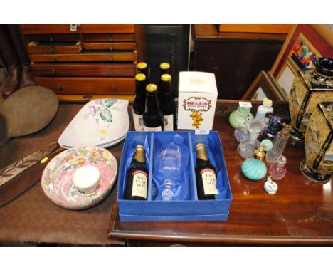 Five bottles of Adnams Centenary Ale; Adnams 100 Year ale with glass and a Bells Scotch whisky