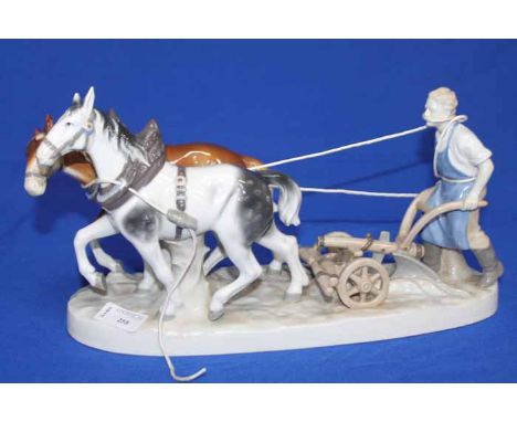 LARGE CERAMIC GROUP OF TWO HORSES PULLING A PLOUGH
marked to the base GDR