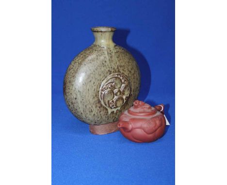 CHINESE TERRACOTTA TEAPOT
together with a moon flask, 25.5cm high (2) 