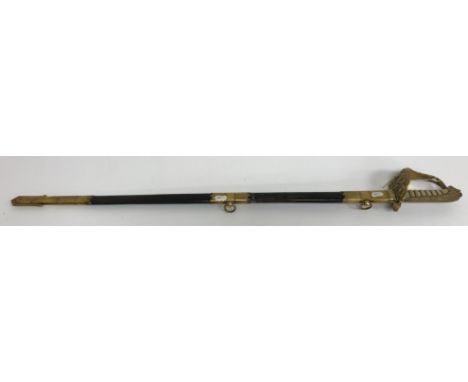 A Royal Naval Officer's dress sword, the fullered blade with engraved decoration of crowned fouled anchor and verso with "J F