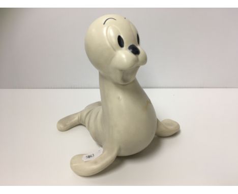 A Wade Heath Walt Disney "Sammy the seal" figure, 16.5 cm high, together with a Wade type (unmarked) figure of seal with ball