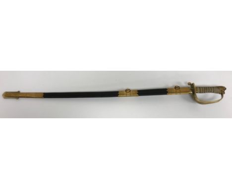 A Royal Naval Officer's dress sword, the fullered blade with engraved decoration of crowned fouled anchor and verso with "J F