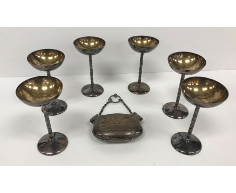 A set of six German 800 silver pedestal sorbet dishes, the gilt washed shallow bowls on bobbin stems to circular feet 10.2 cm