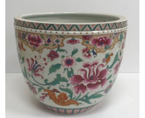 A Chinese famille rose jardiniere with floral decoration and gilt highlights, 29.5 cm diameter x 24 cm high CONDITION REPORTS