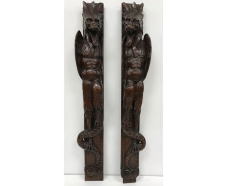A pair of 17th Century French carved oak stiles as gryhons 72 cm long CONDITION REPORTS Various losses etc throughout includi