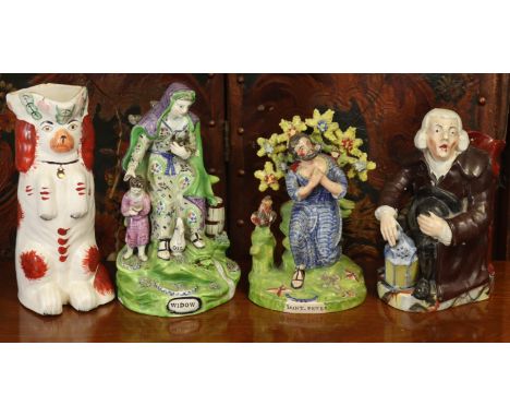 An early 19th century Staffordshire pearlware large, seated female figure titled “Widow”, 25cm high; a similar bocage figure 