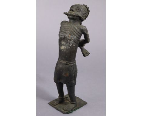A 19th century Anti-Slavery/abolitionist bronze sculpture of a male standing on integral rectangular base, 31.5cm high.