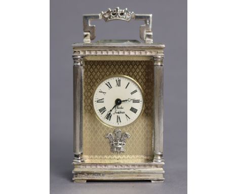 An Elizabeth II silver-cased ‘Prince of Wales’ carriage timepiece commemorating the 1981 royal wedding, with fluted corner co