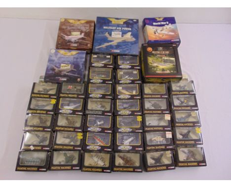 A quantity of Corgi diecast include 100 years of Flight, Fighting Machines, Predator in The Sky, Aviation Archive, D-Day Anni