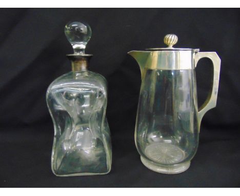 A Victorian glass lemonade jug with silver collar, handle and hinged cover, Birmingham 1889 and an Aspreys decanter with silv