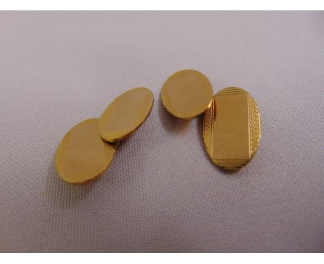 A pair of 10ct yellow gold engine turned cufflinks, approx total weight 5.9g