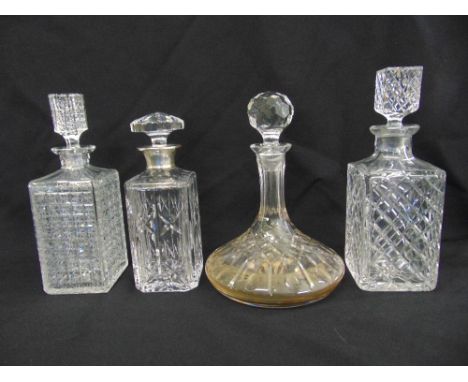 A ships decanter, two hobnail cut lead crystal decanters and Georgian style decanter with silver collar
