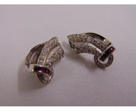 A pair of diamond and ruby earrings, gold tested 9ct, approx total weight 12.2g