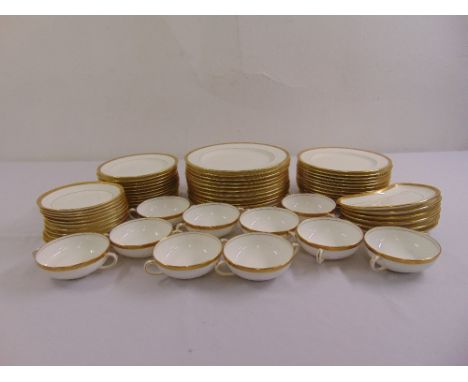 Minton dinner service, white with gilt borders to include plates, soup bowls and saucers  (61)