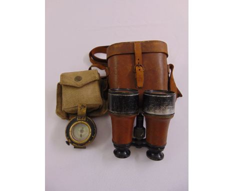 A pair of WWI Dollond Binoculars and a WWII military compass in original canvas case