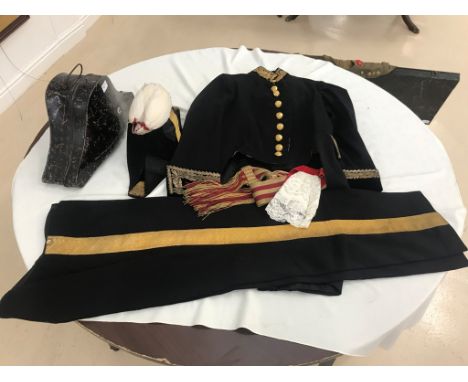 An Edwardian high ranking naval uniform, with bullion detail, bicorn hat, cockade, sash and cravat
