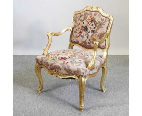 A 20th century French style gilt framed open armchair, with a floral tapestry seat62cm wide