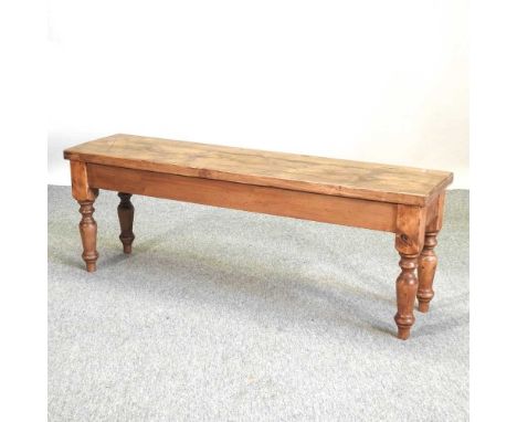 A hand made rustic pine bench, on turned legs130w x 33d x 46h cmCondition report: This was made recently from reclaimed timbe